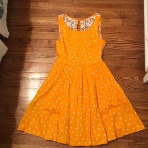 orange-yellow polka dot dress